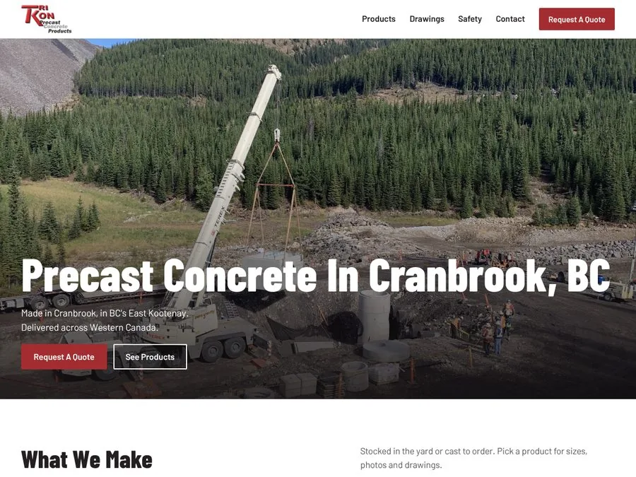 Tri-Kon Precast website hero, a crane lowering precast concrete into place